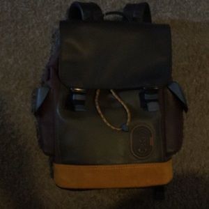 Coach multi colored leather backpack